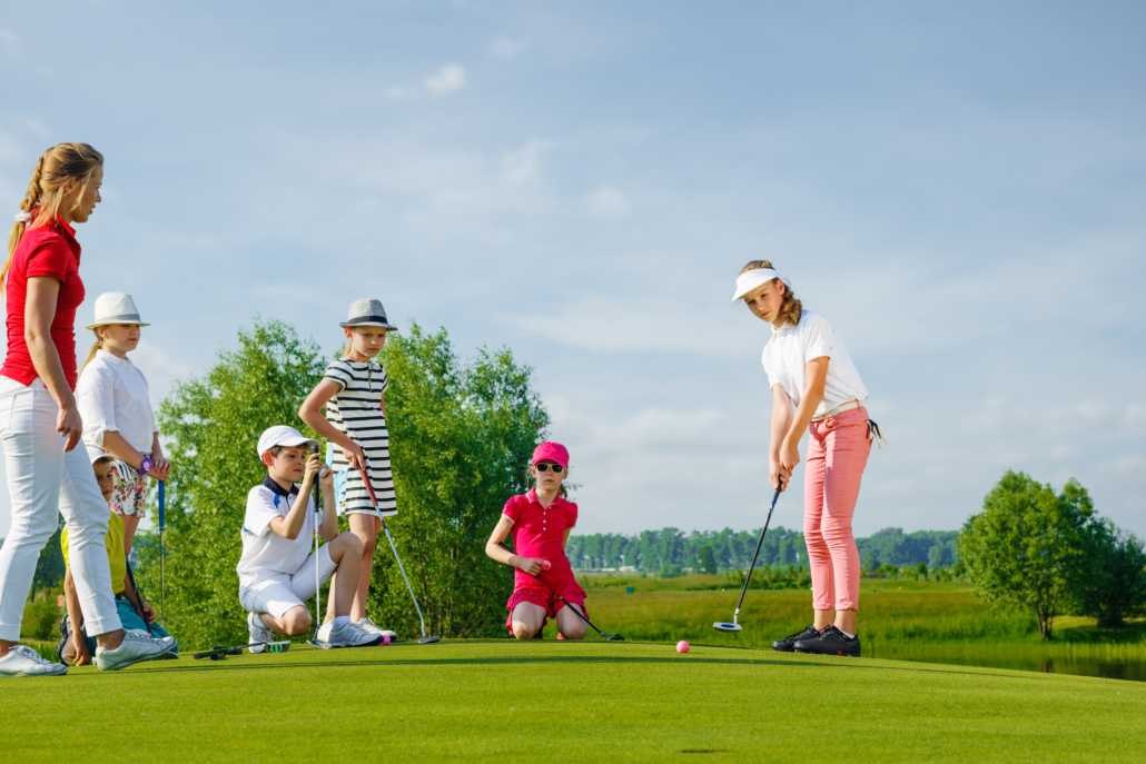 Kids playing golf